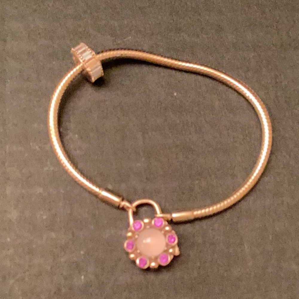 Pandora rose gold bracelet.